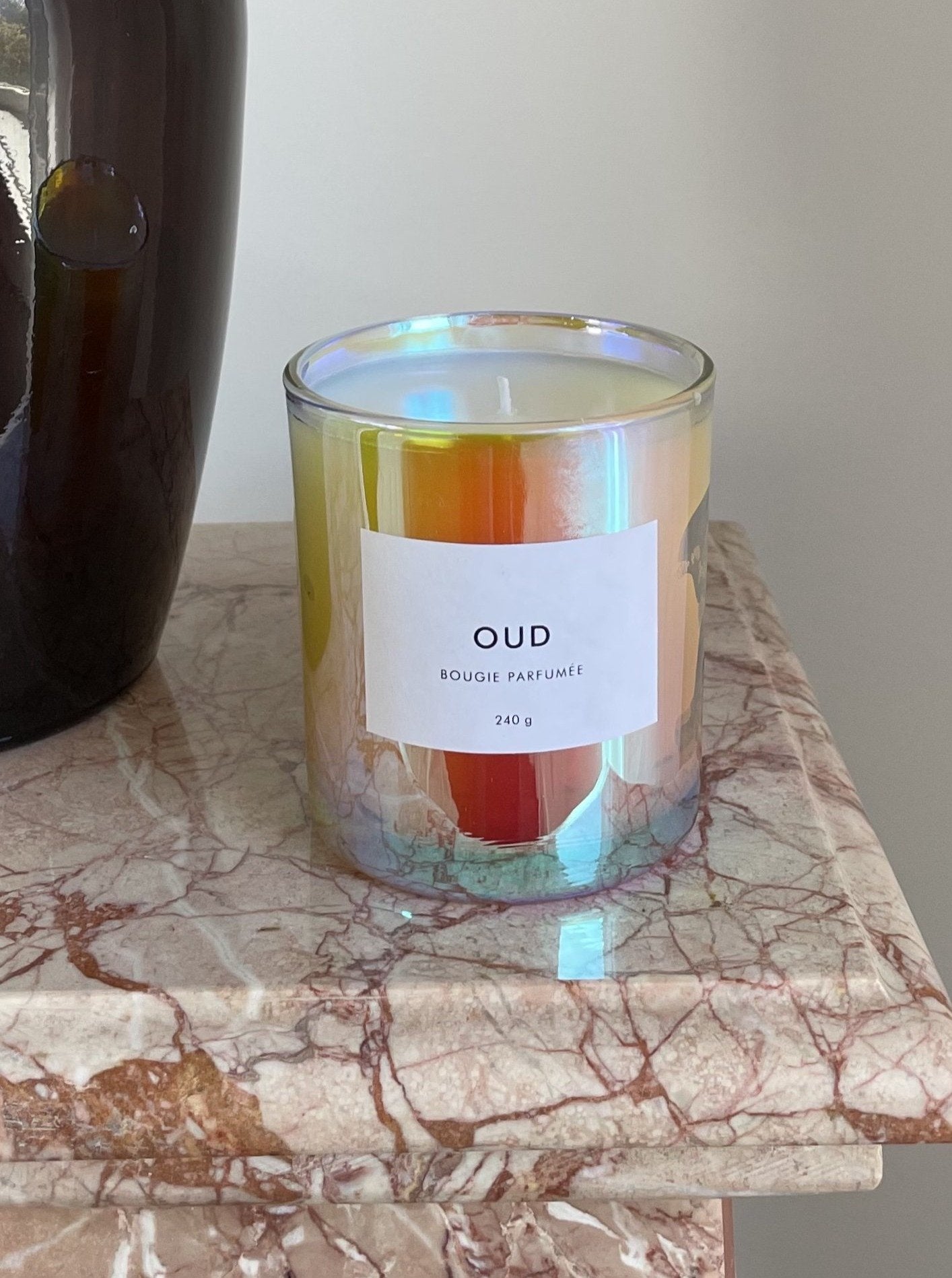 beautiful scented candle in a hologram glass container